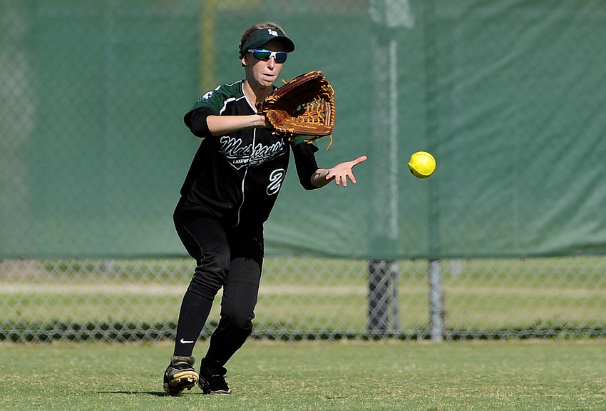 Sophomore right fielder Sierra Schappacher fields a ball.