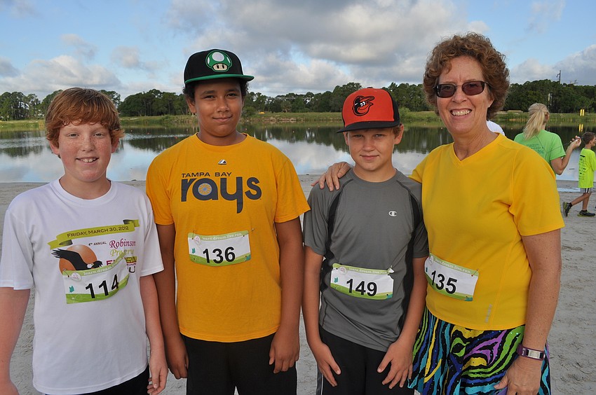 Chase Buckley, Daniel Galvin, Jacob Ahlers and Karen Galvin hoped to stay composed and run more than laugh.