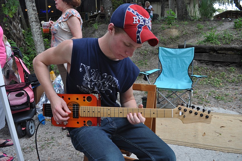 Jacob Brasley played an old-style guitar.