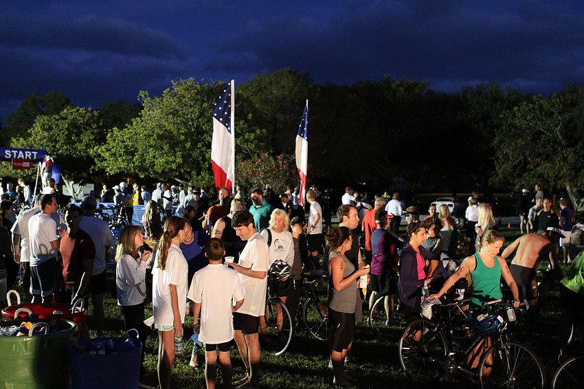 Hundreds of people got their numbers, set up their bikes and had a bit of food before participating in the sprint triathlon Sunday morning.