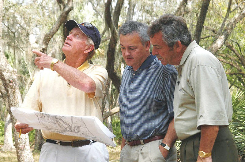 Developer Kevin Daves, center, looks over plans with Jack Nicklaus, left, and Tony Jacklin. Courtesy photo.