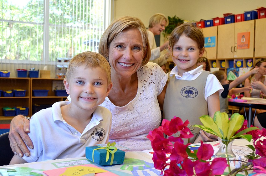 Laura Murphy sits with Caleb and Kate