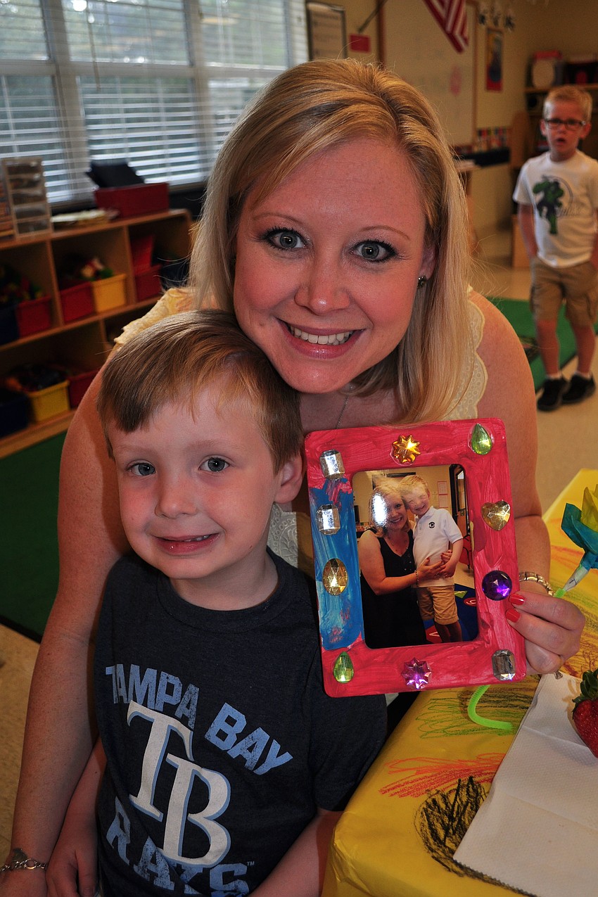 Noah Sasse, 4, feasted on a Pop Tart, while his mother, Angie, enjoyed a muffin.