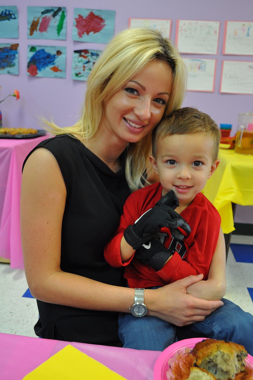 Peter Miller, right, enjoyed time with his mom, Lenka Cenovova, before scampering off to play.