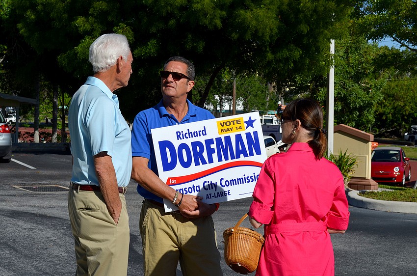 Richard Dorfman chats with voters.