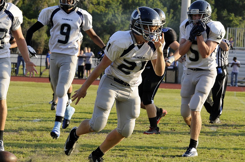 ODA eighth-grader Jason Fineberg reacts after retuning an interception 28 yards during the gameâ€™s opening possession.