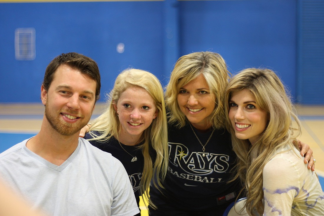 Ben and Julianna Zobrist, far right, with sixth-grader Alexa Mast and her mother, Tammy