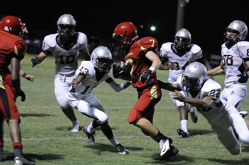 Cardinal Mooney freshman Alex Sobczak rushes for a yard in the fourth quarter.