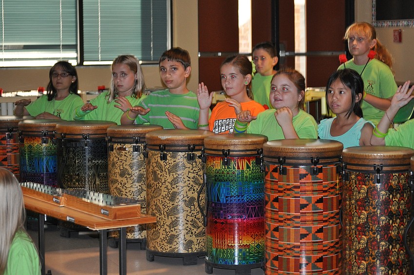 A line of drummers played Lexiâ€™s favorite songs.