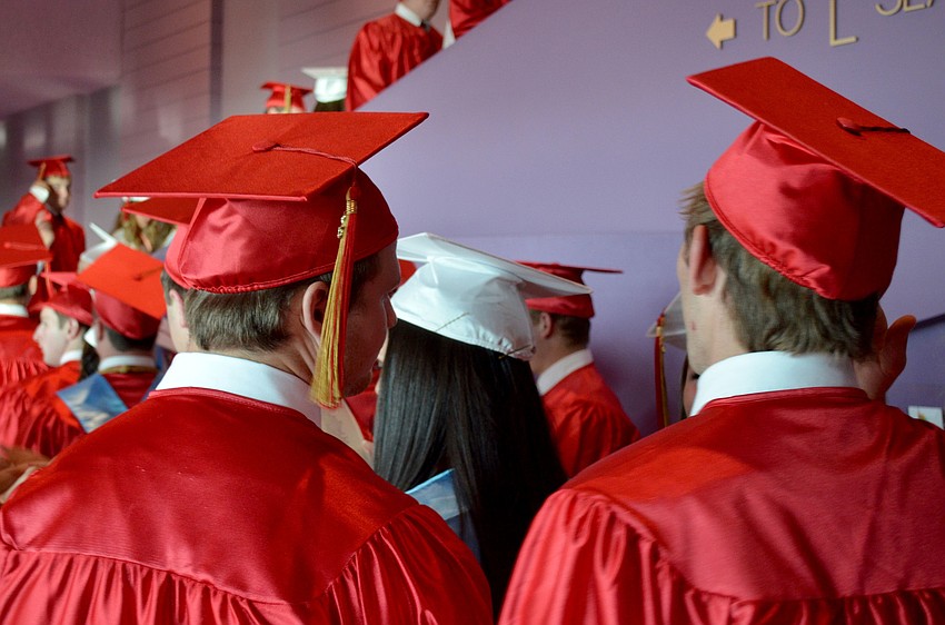 Cardinal Mooney seniors wait to enter the auditorium at the Van Wezel.