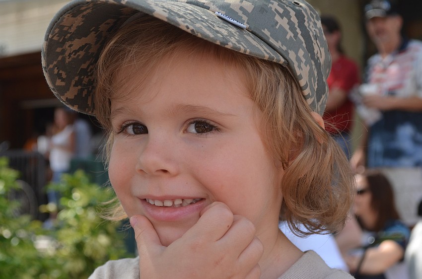 Four-year-old Kai Bartholonew wears an Air Force uniform since his grandmother is in the Air Force.