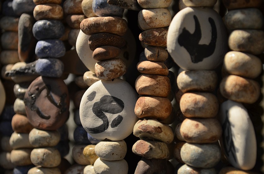 A detail of â€œTaumangaluka Iâ€ by Woodrow Nash. He made each bead individually.
