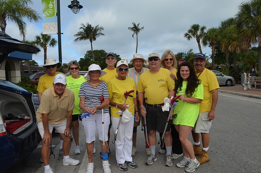 Peter vanRoekens picks up trash in the Village.