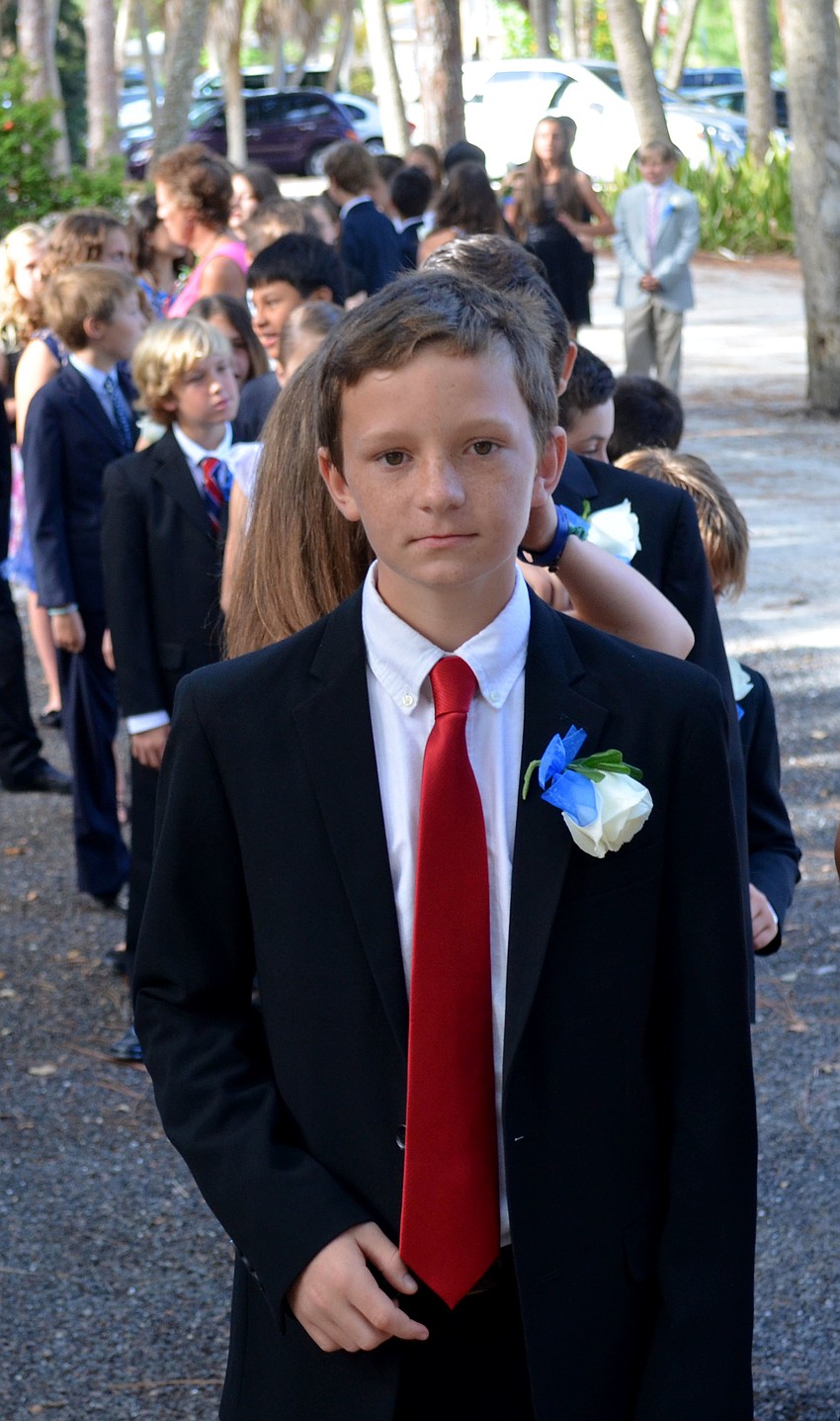 Chase waits to enter Siesta Key Chapel before graduation.