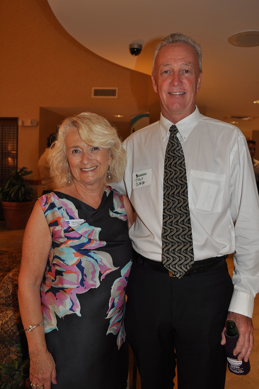 Pam Kalaczynski, sales manager for the Holiday Inn Express, with Tony Dempsey, of Sunstate Business Brokers
