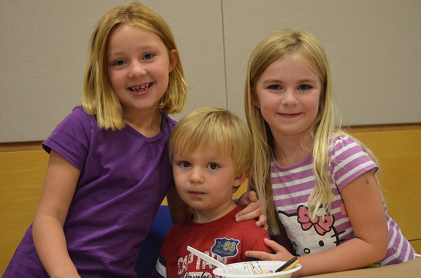 Emma Jordan, 6, came to watch the magic show with her brother Luke, 2, and sister Mia, 4.