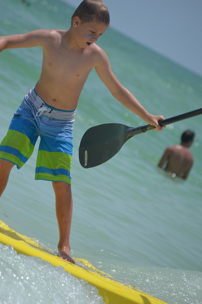 Walker Grande tried out paddle boarding at the Kids Paddle session.