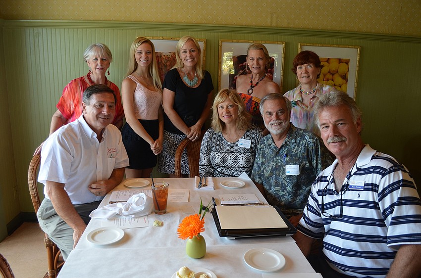Longboat Key Chamber members prepare for a meal at Tommy Bahama.
