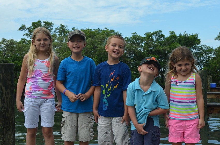 Bella McCants with her cousins Brooks, Zachary and Chase Caldwell and her little sister, Zoe
