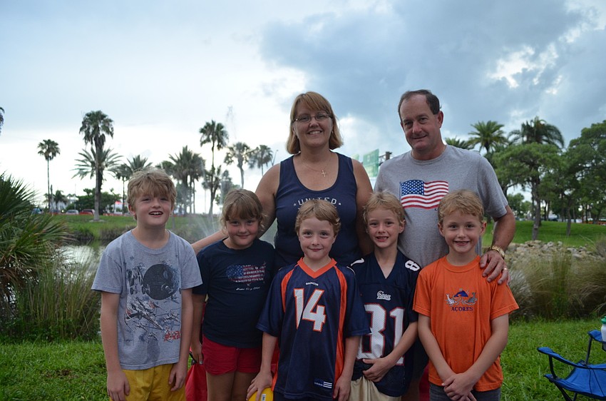Cooper Gorman, 9, with his quadruplet siblings Katie, Garrett, Hunter and Ryan and his dad Herbie