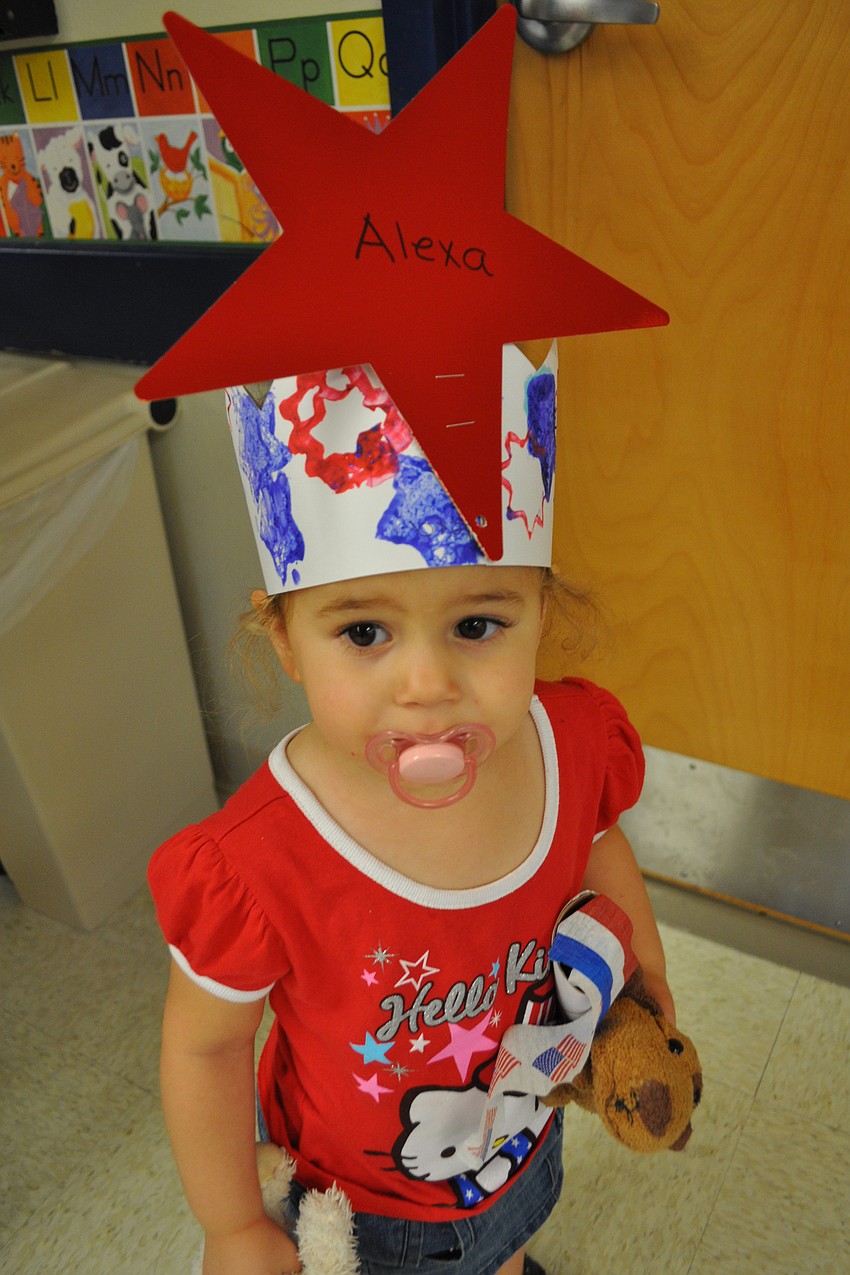 Alexa Keshish, 2, looks for her parents.