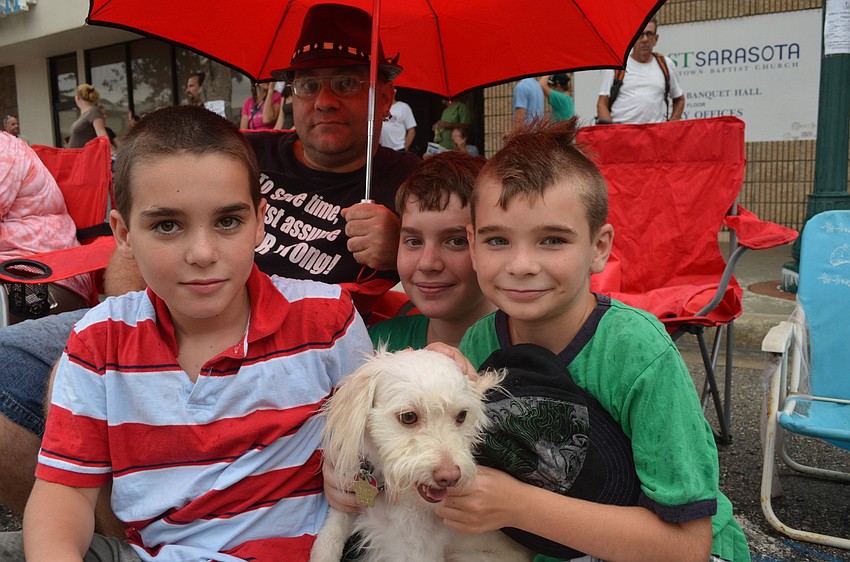 Rob Lavalle, Kyle Wiegand, 9, Tyler Wiegand, 13, Tobias Lavalle, 8, and their two-year-old dog Molly