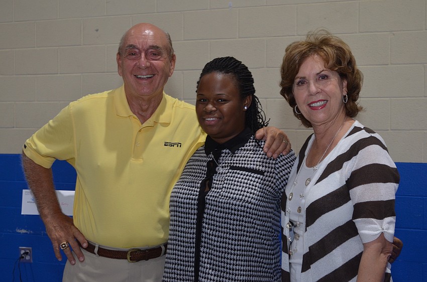 Dick and Lorraine Vitale present Booker High School Senior Allyiah Bartley with a $1,000 Scholarship. Bartley plans to attend Valencia Community College where she will study physical therapy.