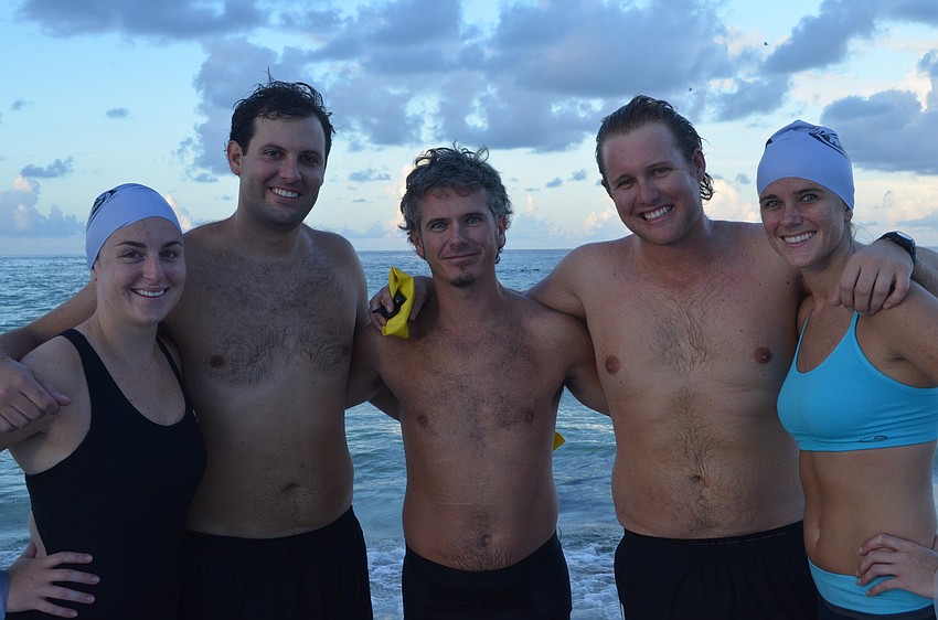 Ashley and Greg Venturoni, Jared Carter and Chris and Allison Loft get ready to participate in the Sprint Triathlon.