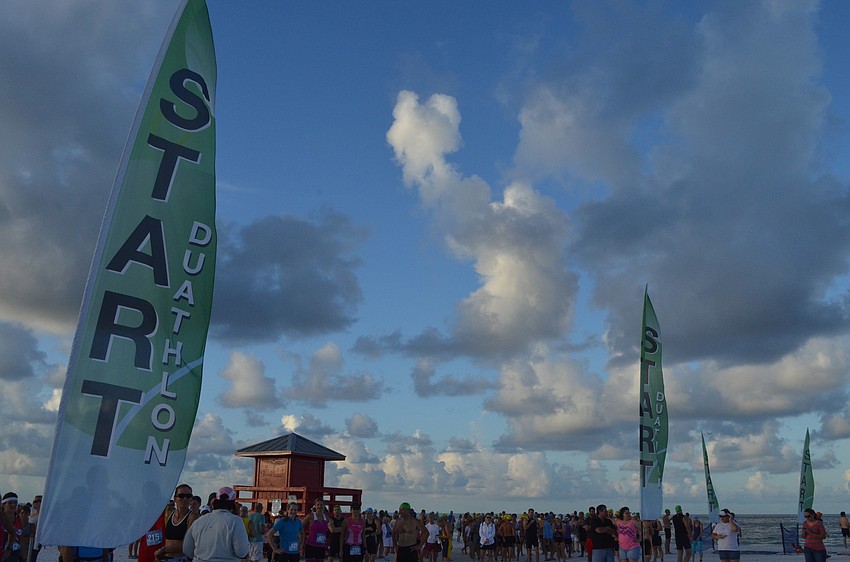 Athletes mingle and wait for the beginning of their races.