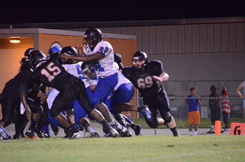 The Sarasota Sailors play hard during the game.