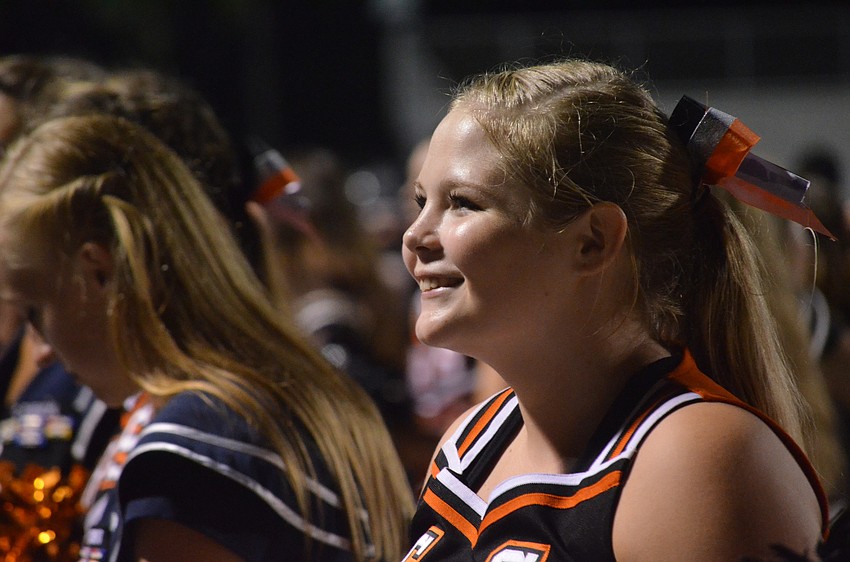 Senior Trish Konzel interacts with the crowd during the game.
