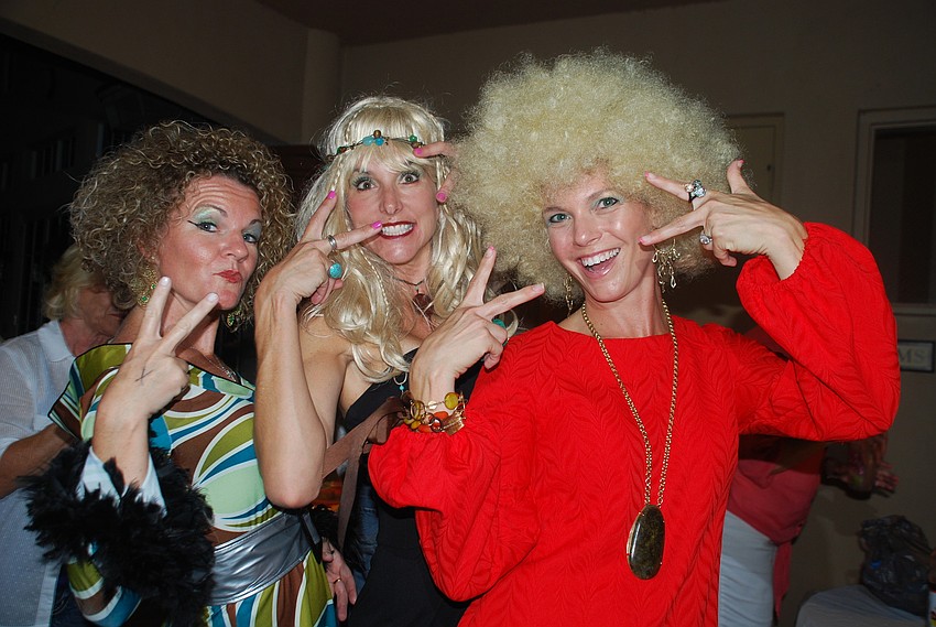 Kim Flores, Natalie Johnson and Jeanne Cody dressed the part in full costume.