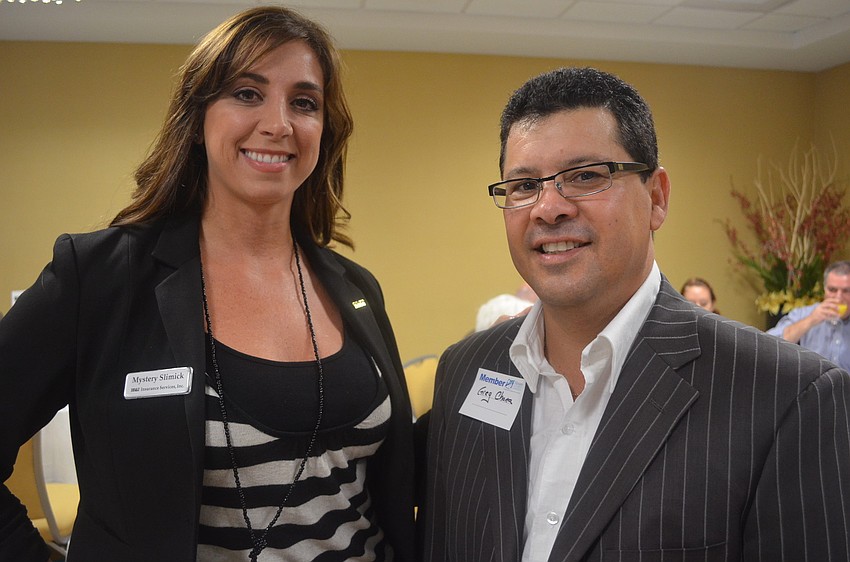 Mystery Slimick of BB&T Insurance Services, Inc., and Greg Chona of Ameriprise Financial