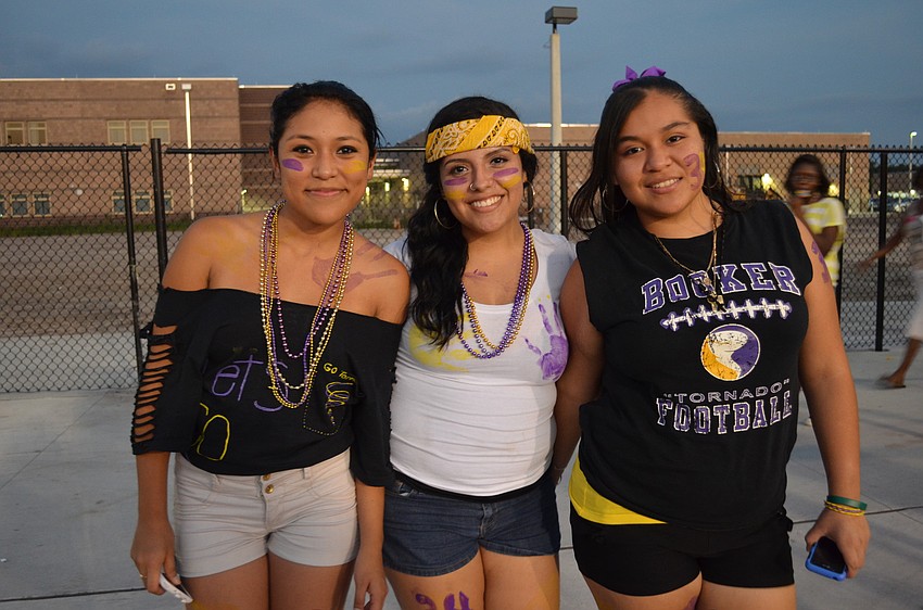 Booker High School juniors Jennifer Flores, Paula Gonzalez and Regina Mantero show off their school spirit.