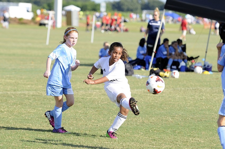 Florida Krush Blackâ€™s Kayla Banks attempts a shot against FC Florida.