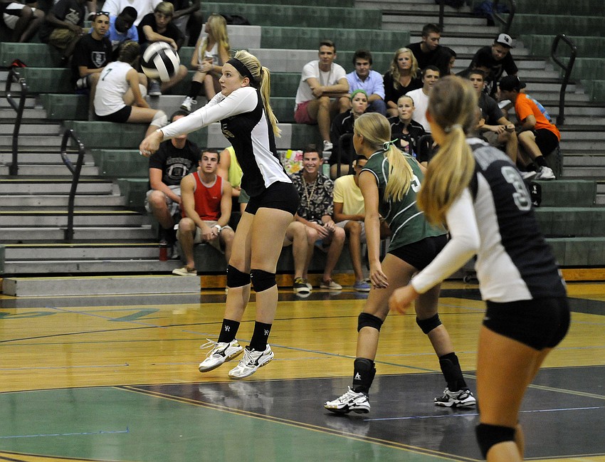 Lakewood Ranch senior Ashlyn Falahee digs the ball to a teammate.