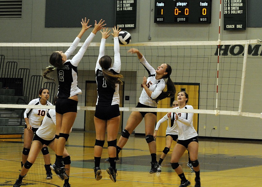 Sarasota sophomore outside hitter Jessica Shiffner attempts a shot in Game 2.
