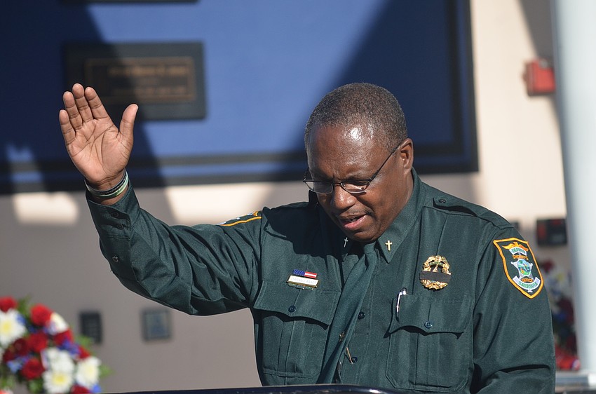 Chaplain J. Walker says a prayer to remember those who died on Sept. 11.