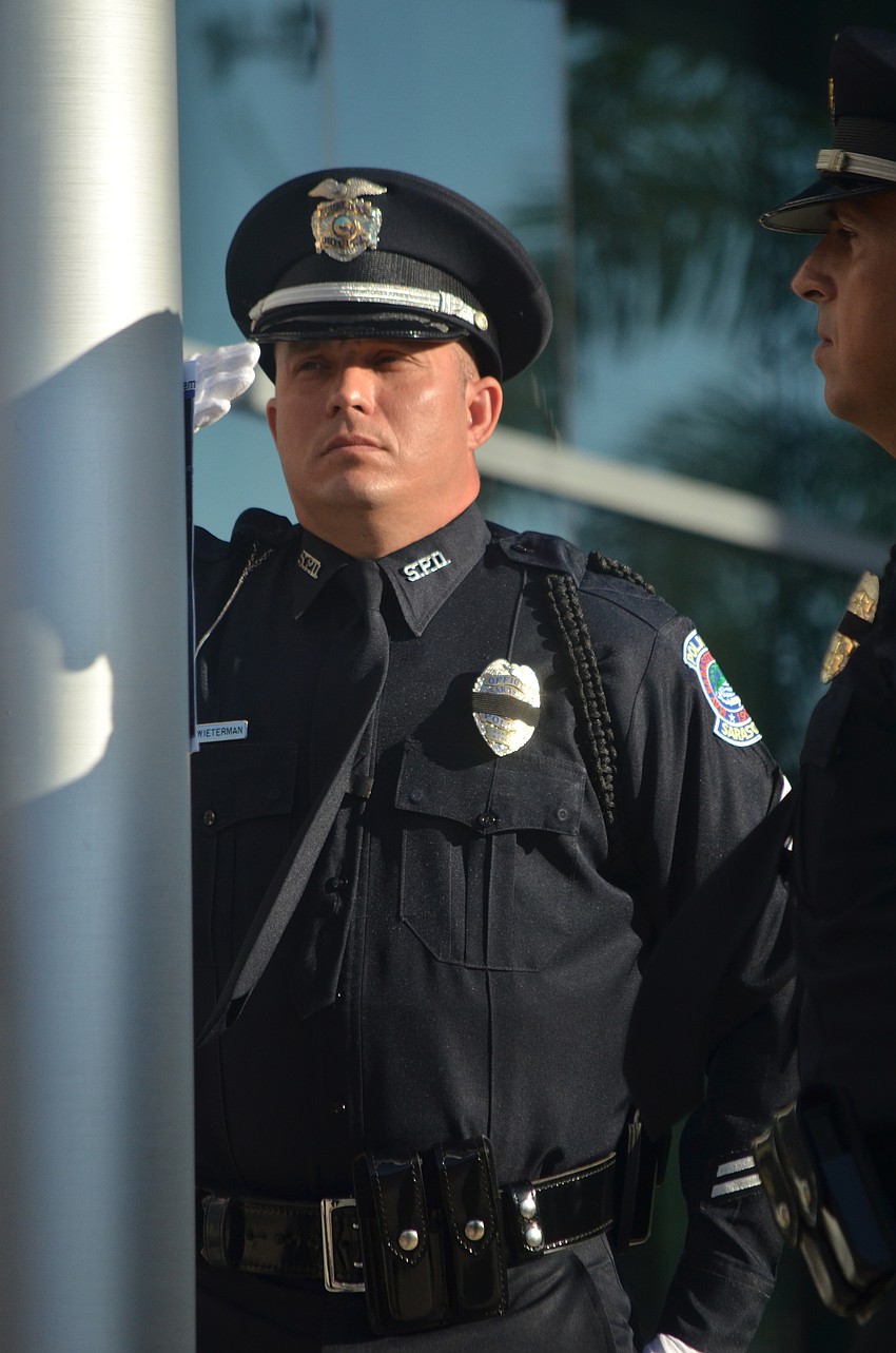 Sgt. Mike Schwieterman calls orders during the ceremony.