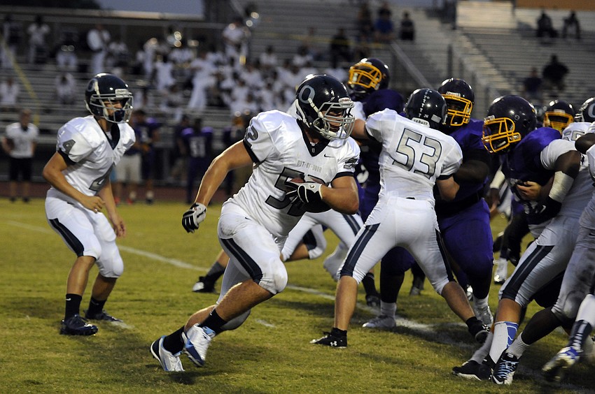 ODA senior Max Provost carries the ball for a 4-yard gain.