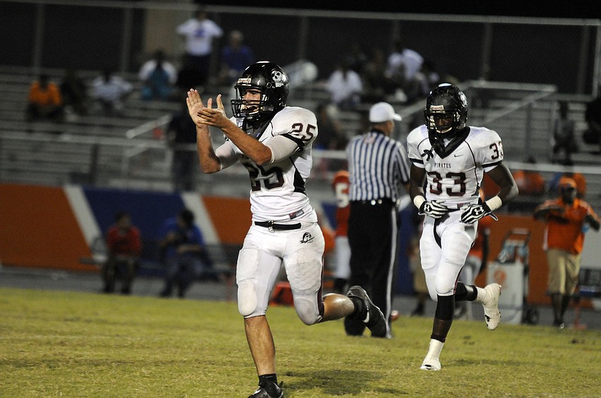 Zach Maugherman celebrates following the Pirates third fumble recovery.