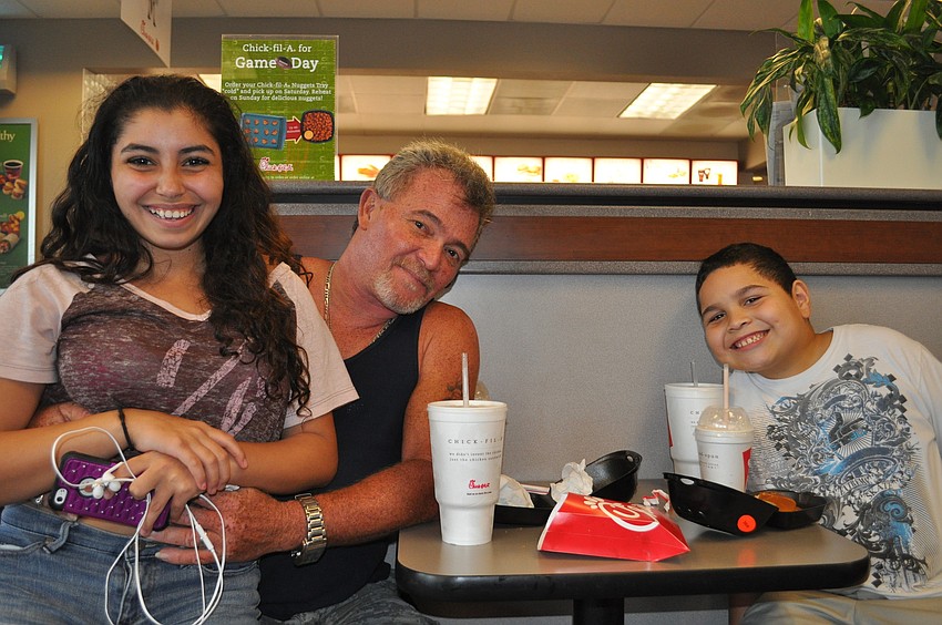 Luis Ruiz treated his children, Victoria Anglo and Jeyser Colon, to milkshakes.
