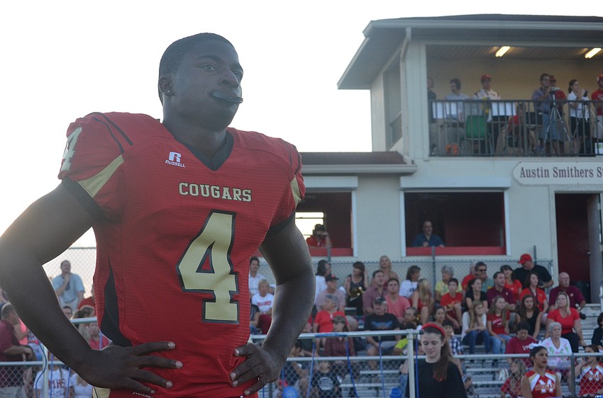 Senior Demardre Patterson waits to get on the field and into the game.