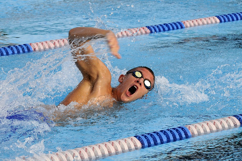 Sarasota Christianâ€™s Holton Irwin races down the home stretch of the boys 50-yard freestyle.