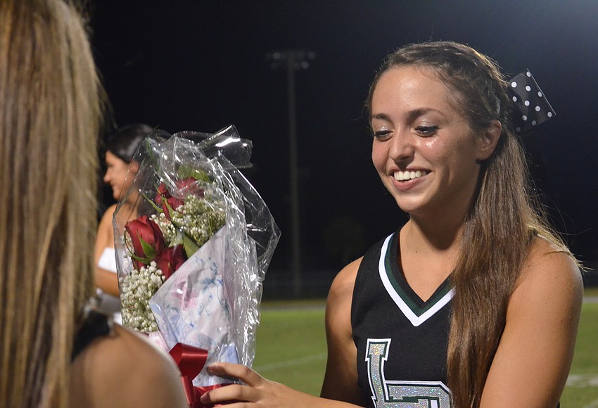 Your Observer Photo queen Marina Masterson receives