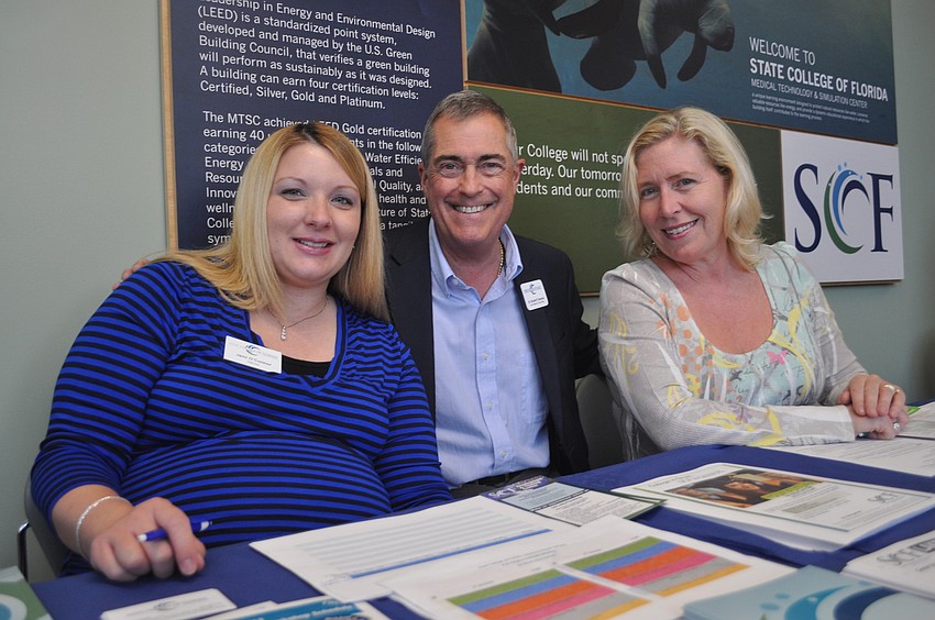 Jami Oâ€™Connor, SCF student development adviser, with Dr. Donald Bowman, vice president of student affairs and Gina Odoardi, a financial aid staff member