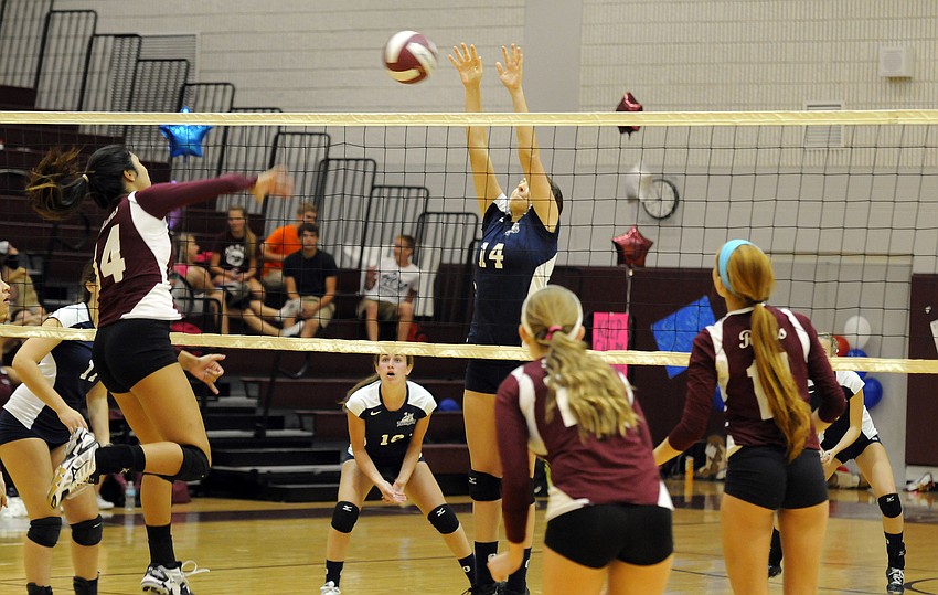 ODA junior Taylor Albano goes up for a block in the beginning of the second set.