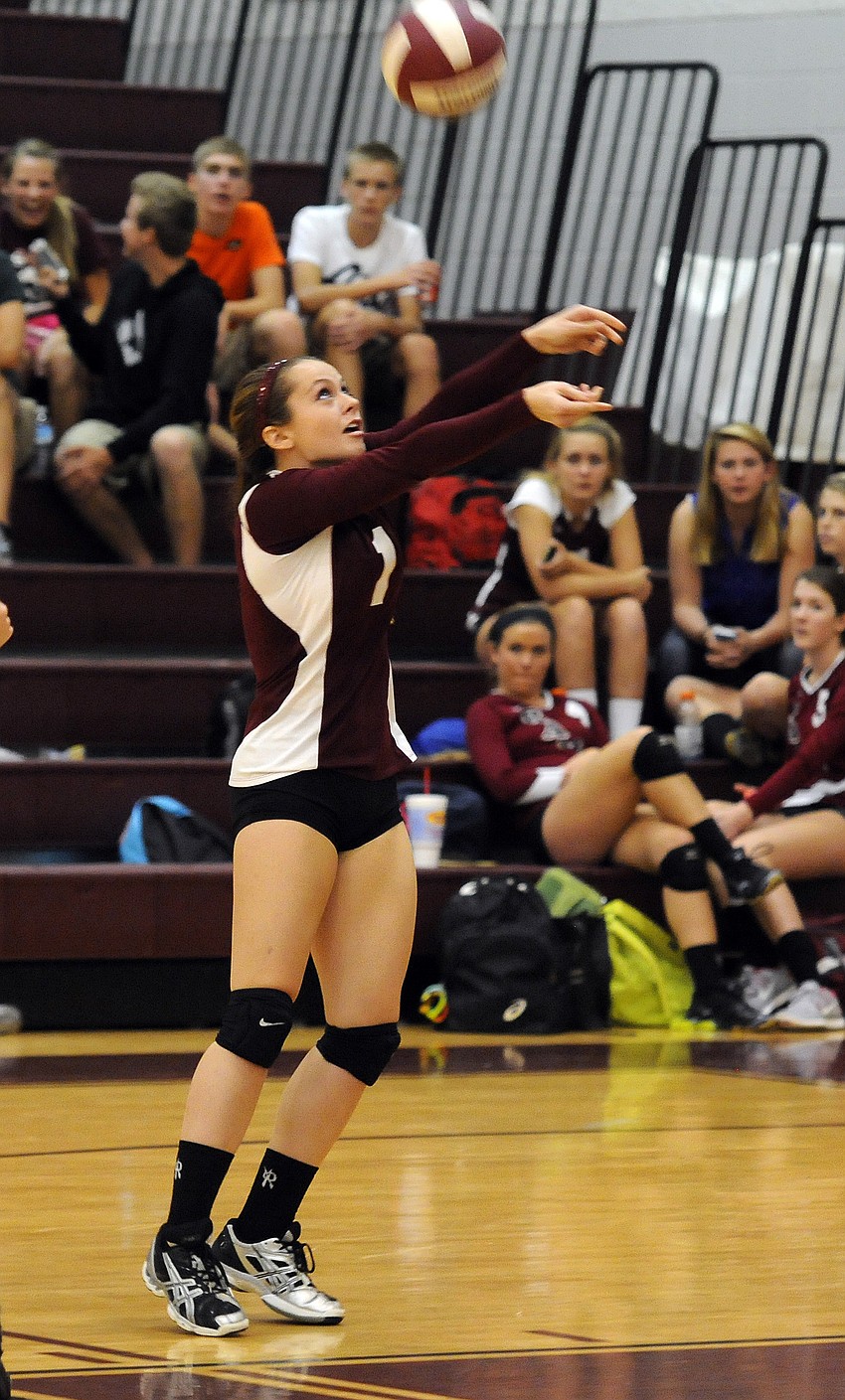 Riverview senior defensive specialist McKenzie Smith saves a point in first set.