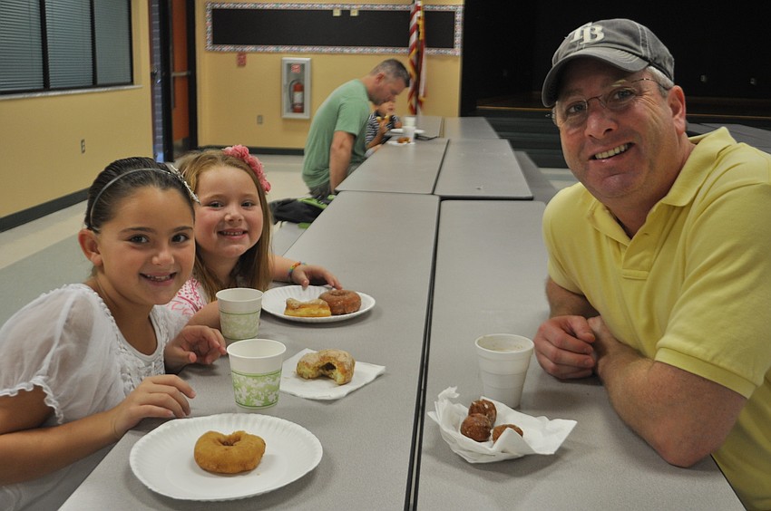 Ava, 8, Aubrey, 6, and Tony Barak