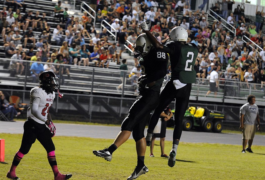 Lakewood Ranchâ€™s Wyatt McLeod and Cameron Pearcey celebrate following McLeodâ€™s 1-yard touchdown catch in the second quarter.
